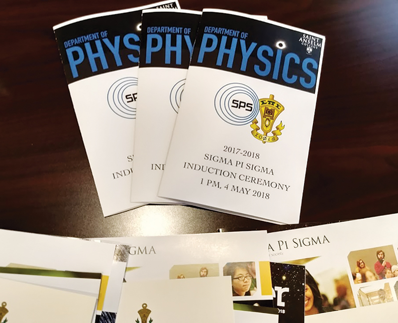 Induction materials from the installation of the Saint Anselm College Sigma Pi Sigma chapter. Photo courtesy of Brad Conrad.
