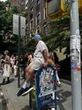 Man people-watching at Pride.
